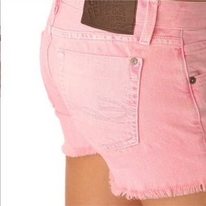 Pink cutoff shorts